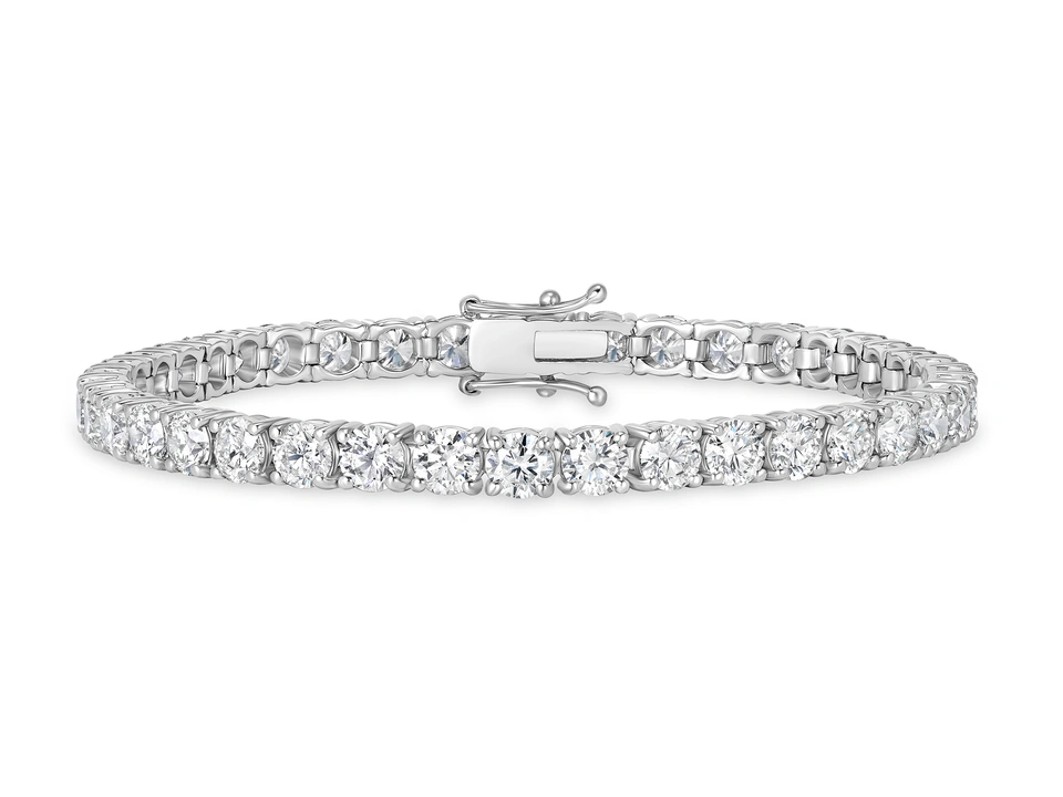 Silver-colored tennis-style bracelet with a row of clear stones